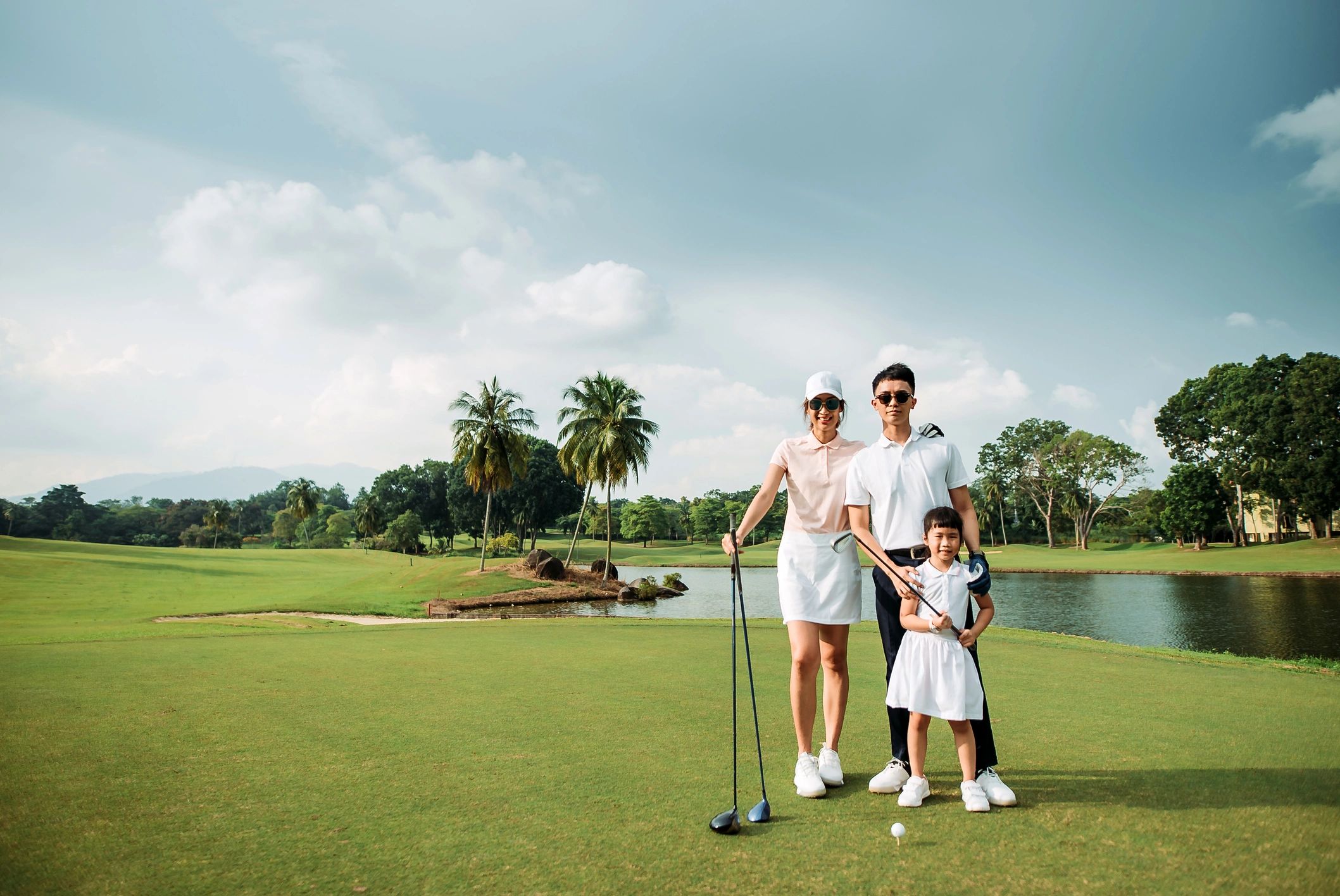 People enjoying a day on a golf course