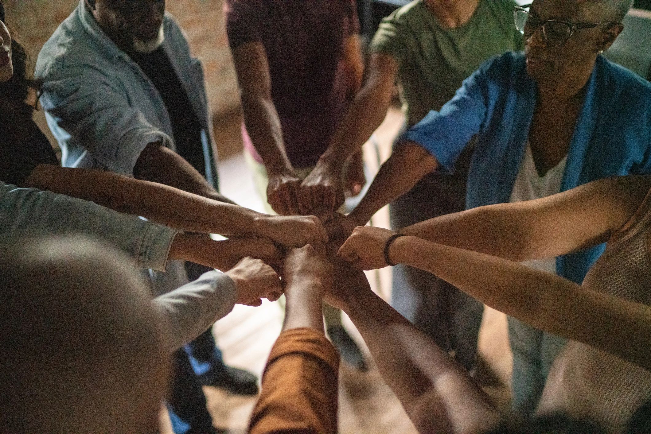Team fist bump showing unity